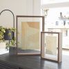 Tmavě hnědý dřevěný fotorámeček Kave Home Flavina 31 x 22 cm -fv-interier-25