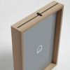 Tmavě hnědý dřevěný fotorámeček Kave Home Flavina 31 x 22 cm -fv-interier-25