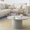 Šedý kovový konferenční stolek Kave Home Fleksa Ø 72 cm -fv-interier-25