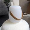 Bílá plastová stolní LED lampa s bluetooth reproduktorem Carin -fv-interier-25
