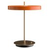 Oranžovo-zlatá kovová stolní LED lampa Asteria