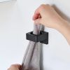 Černý plastový držák Yamazaki Film Hook 6 x 6,2 cm