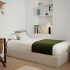 Zelený pléd Kave Home Odelna 130 x 170 cm -fv-interier-25