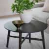 Tmavě hnědý dubový konferenční stolek ROWICO FILIPPA ⌀ 90 cm -fv-interier-25