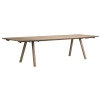 Světle hnědý dubový rozkládací jídelní stůl CLAPPERTON 220/310 x 95 cm