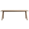 Světle hnědý dubový rozkládací jídelní stůl CLAPPERTON 220/310 x 95 cm
